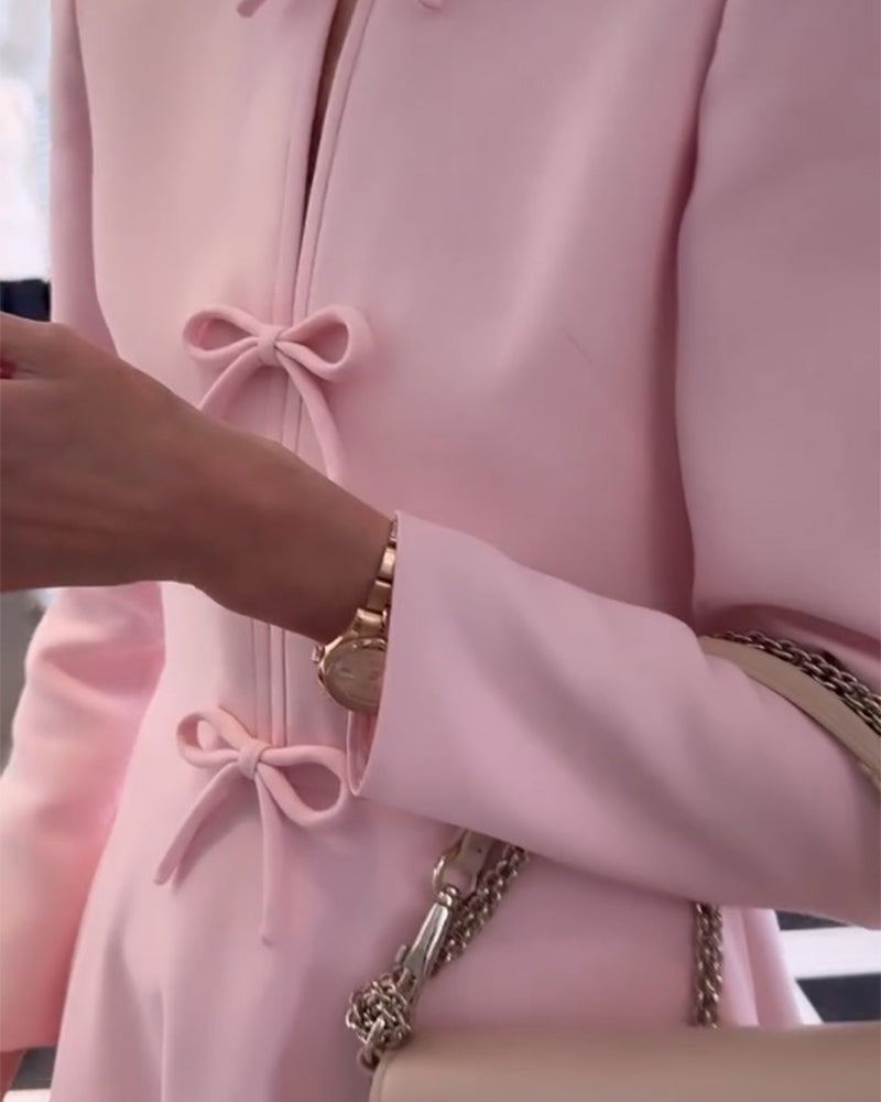 Arial | Elegancka sukienka w jednolitym kolorze z kokardkami