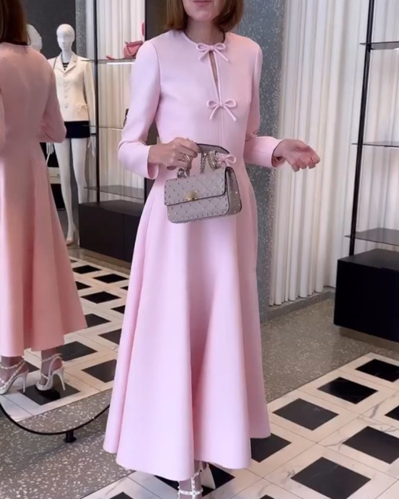 Arial | Elegancka sukienka w jednolitym kolorze z kokardkami