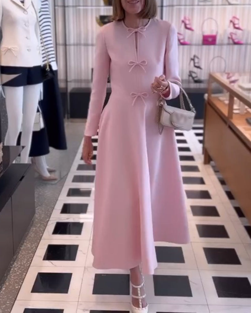 Arial | Elegancka sukienka w jednolitym kolorze z kokardkami