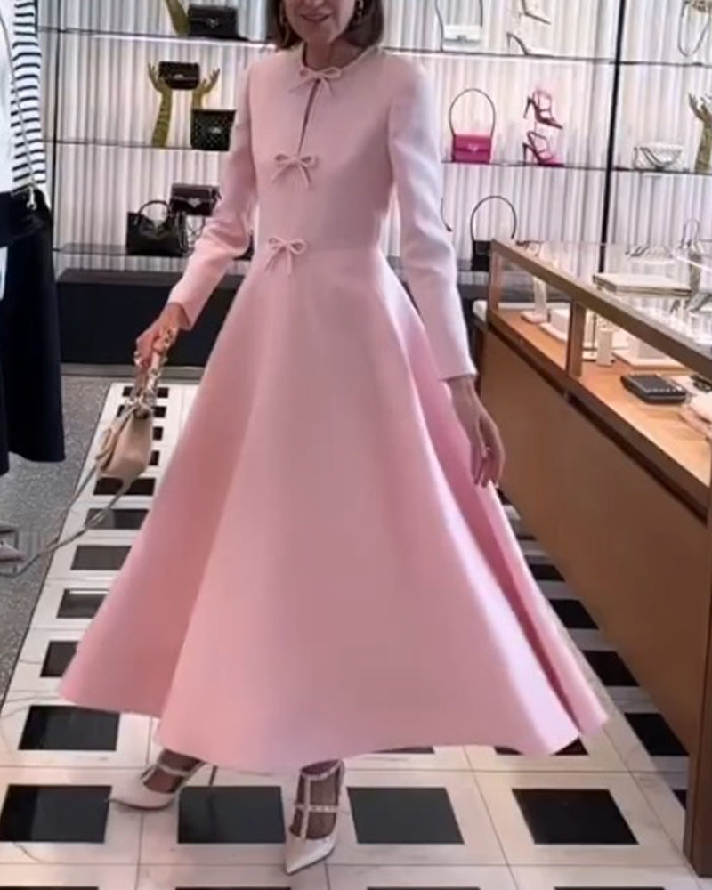 Arial | Elegancka sukienka w jednolitym kolorze z kokardkami