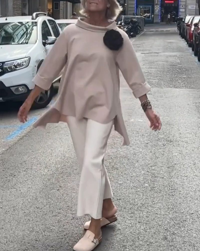 Elegancka bluzka o nieregularnym kroju i długich rękawach