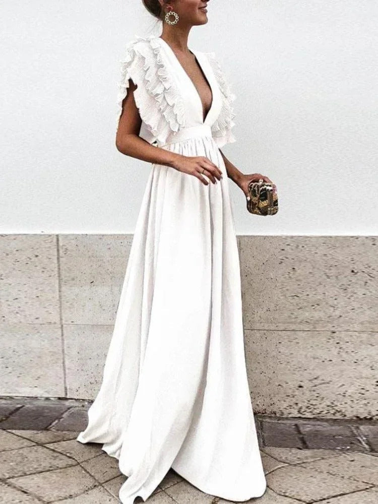 Ceci - Elegancka sukienka z dekoltem w serek i rękawami z falbanami