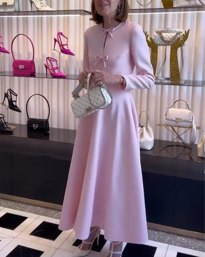 Arial | Elegancka sukienka w jednolitym kolorze z kokardkami