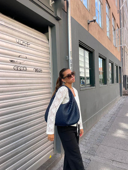 Woven handbag as a must-have