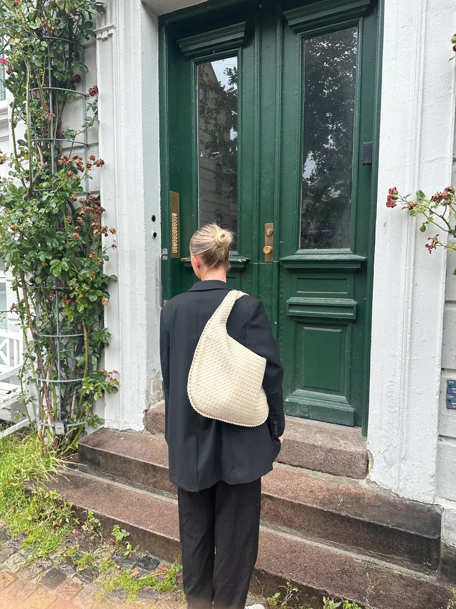 Woven handbag as a must-have