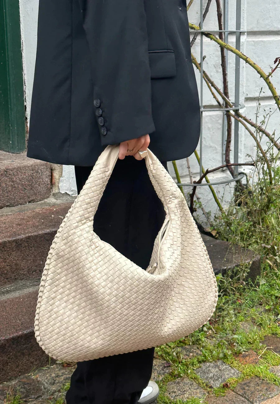 Woven handbag as a must-have