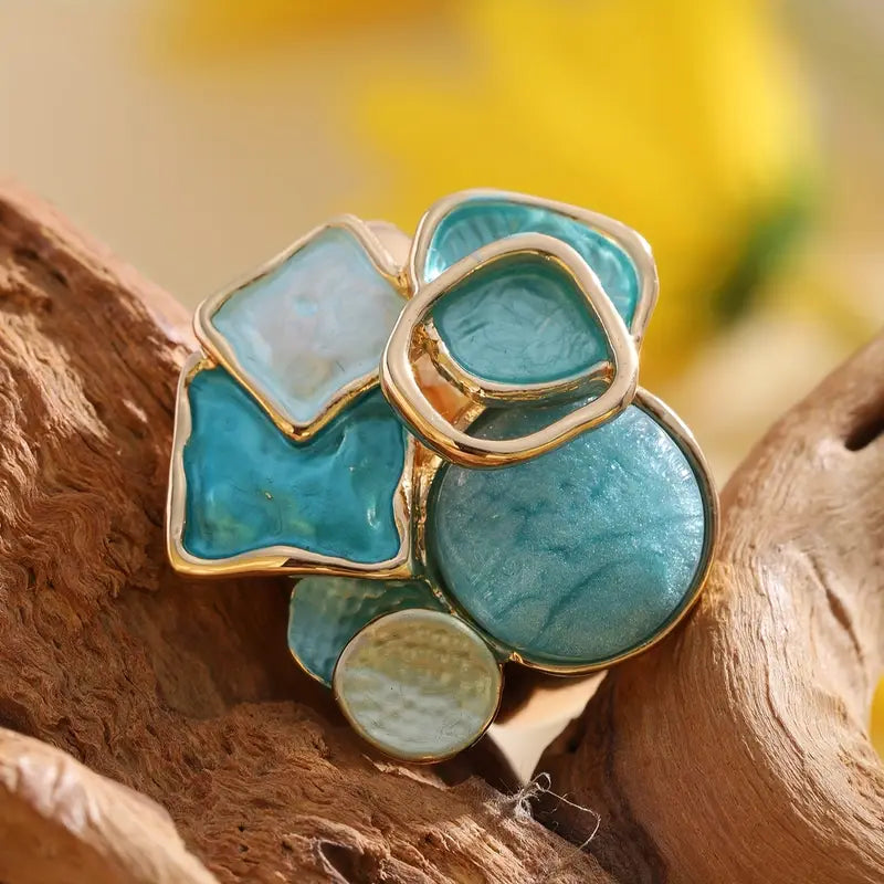 Pierścionek artystyczny – Złoty design z turkusowymi detalami