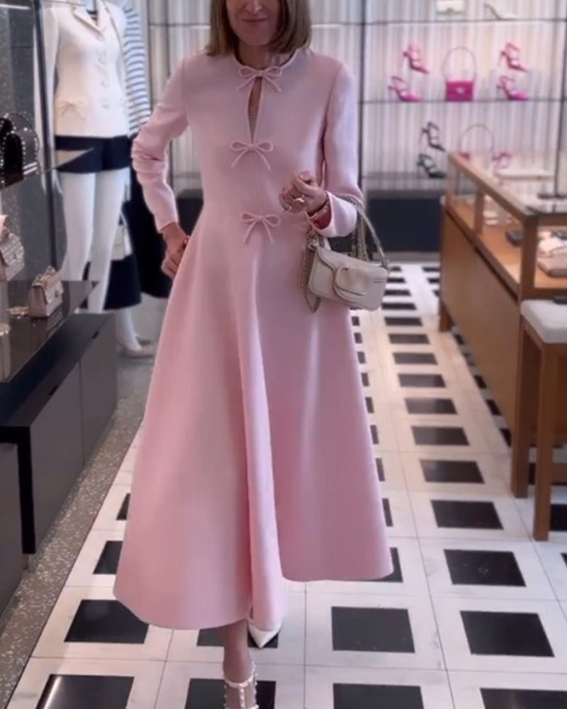 Arial | Elegancka sukienka w jednolitym kolorze z kokardkami