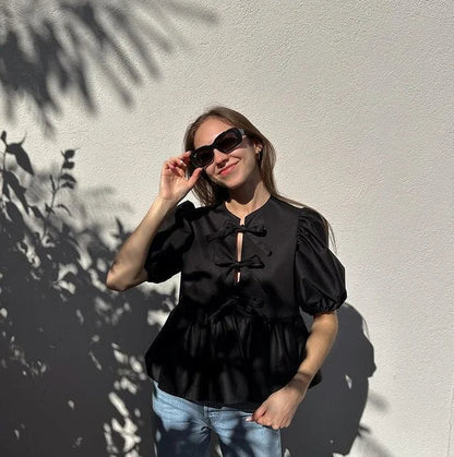 Róża | Modna bluzka z wzorem w panterkę i bufkami