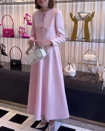 Arial | Elegancka sukienka w jednolitym kolorze z kokardkami